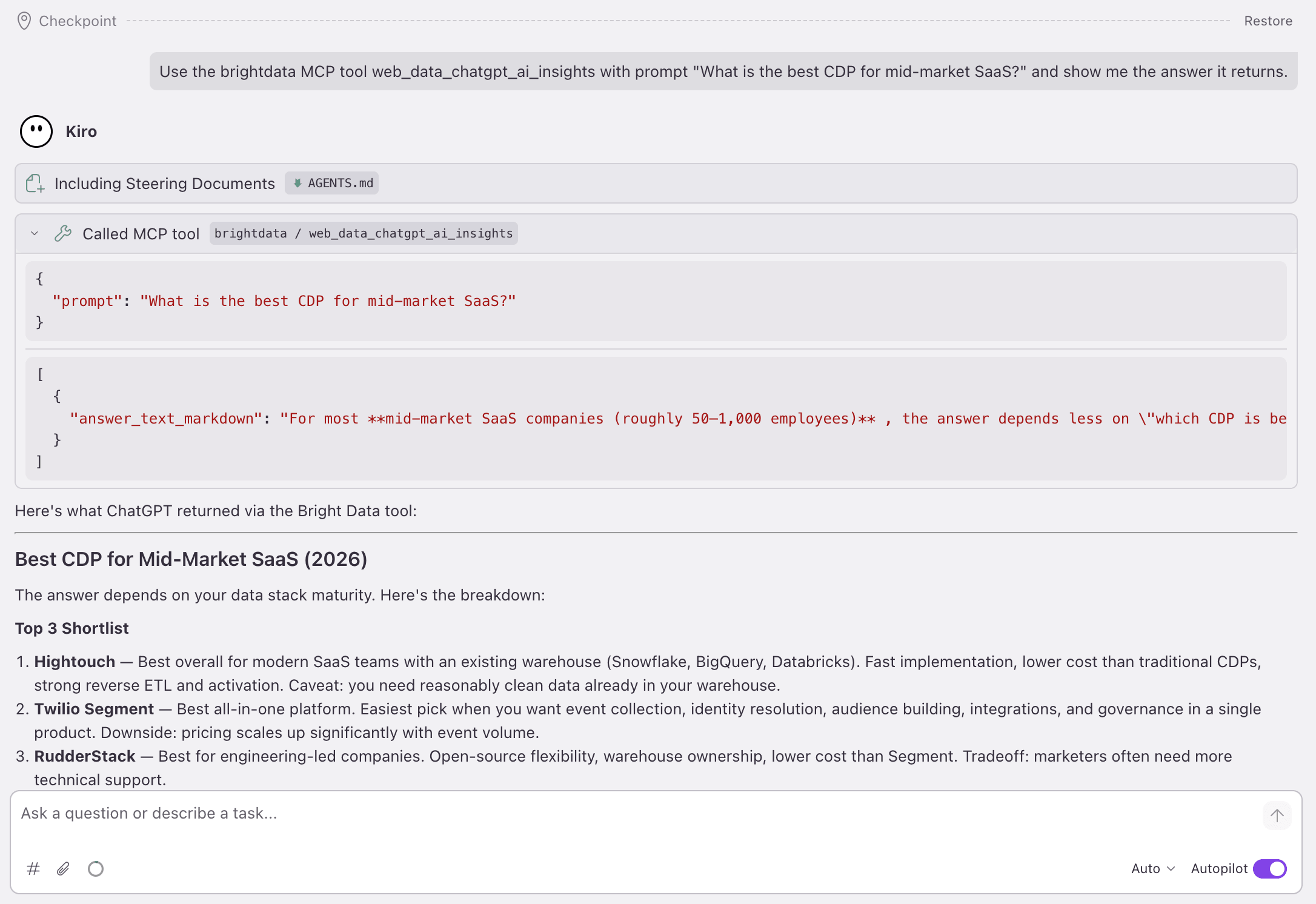 Kiro running web_data_chatgpt_ai_insights: one `prompt` in, one `answer_text_markdown` out; the answer ranks Hightouch, Twilio Segment, RudderStack.