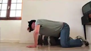 Person prone on floor in work position