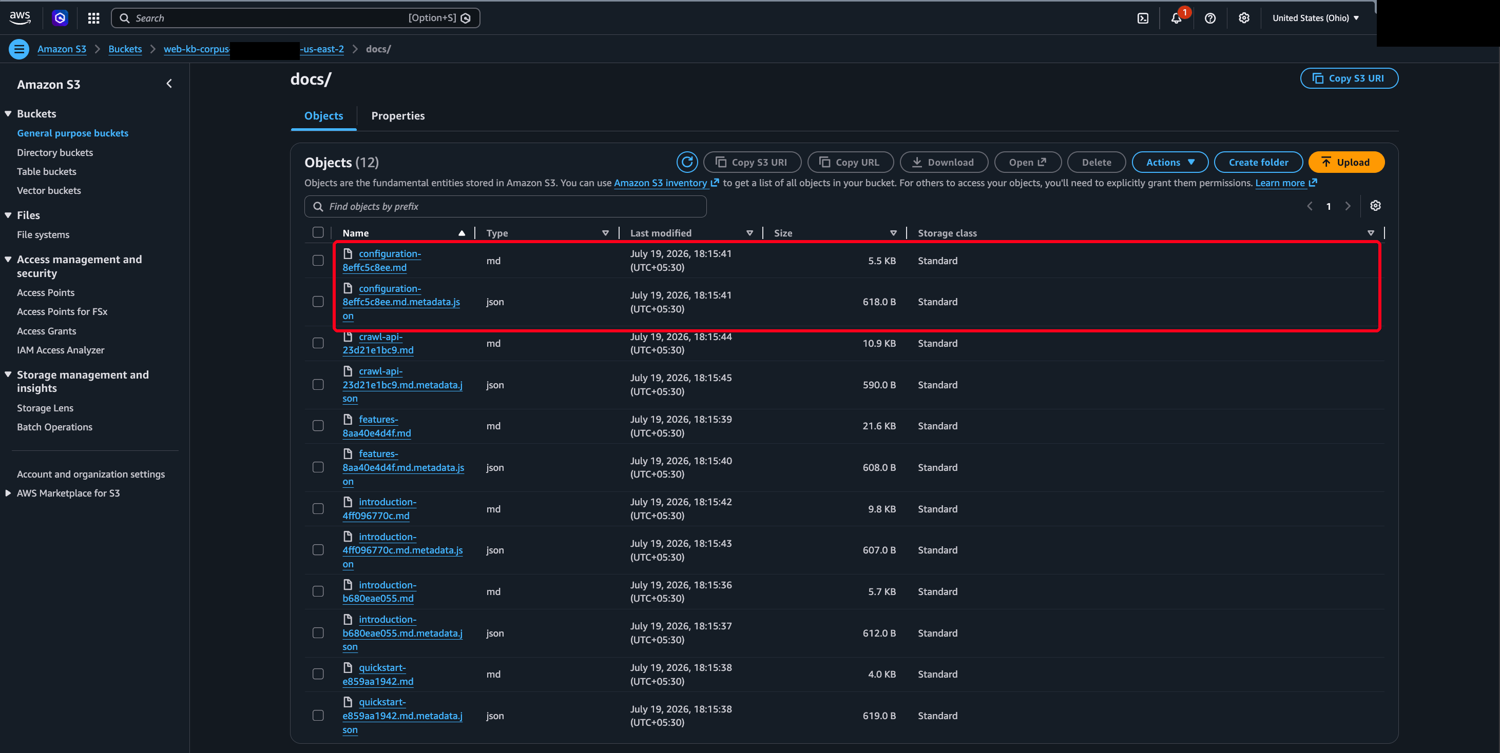 Amazon S3 console showing the docs/ prefix listing 12 objects in 6 pairs, each Markdown document followed by its .metadata.json sidecar of the same name. Documents run 4.0 to 21.6 KB, sidecars 590 to 619 bytes. A red box marks the first pair.
