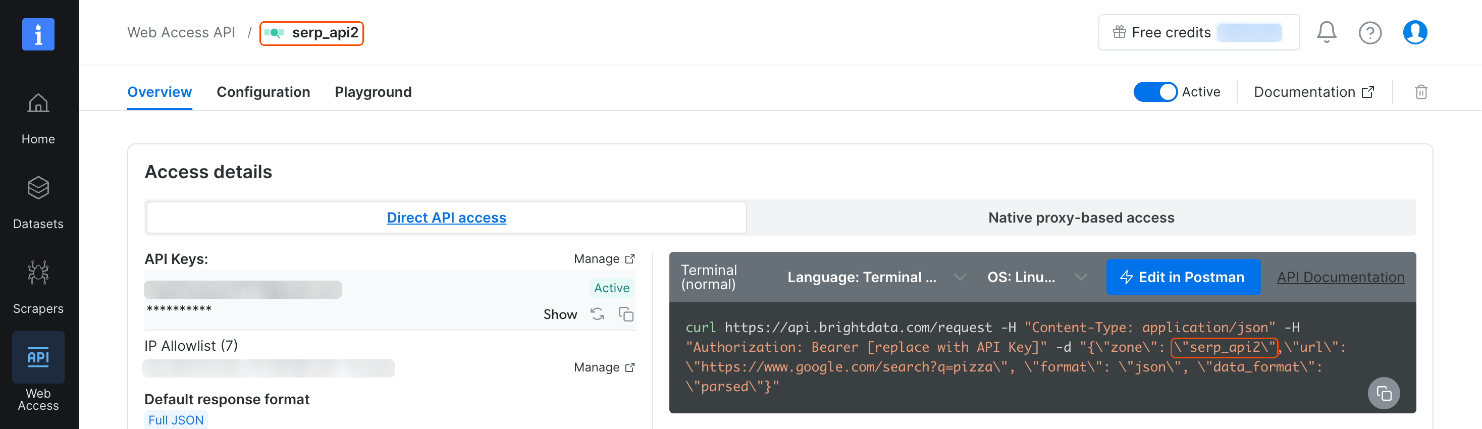 Bright Data control panel, Web Access API, serp_api2 zone, Overview tab. Access details list API Keys with a Manage link, an IP Allowlist, default response format Full JSON, and a curl sample request. The zone name is highlighted in the page header and in the sample request. The API key, IP addresses, and free-credit counter are masked.